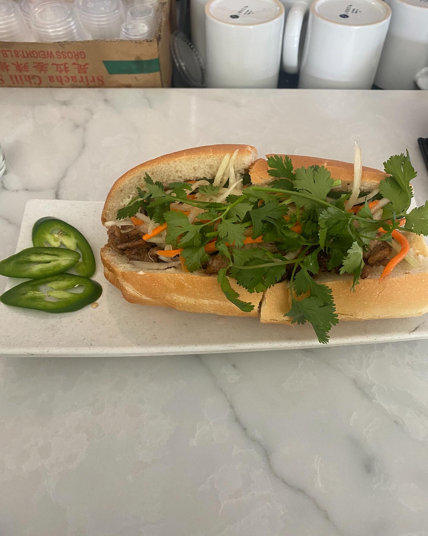Crispy Vietnamese bánh mì sandwich with fresh fillings